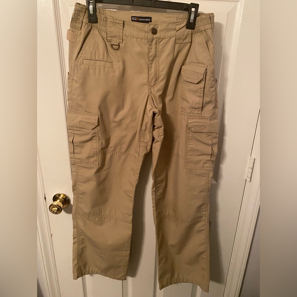 Women’s 5.11 Tactical Series Pants Size 10. Small ink spot on bottom of one leg.